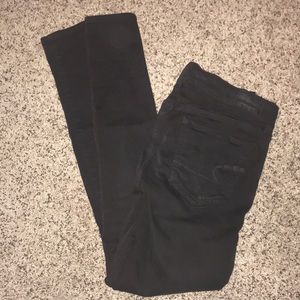 women’s black ripped jeans
